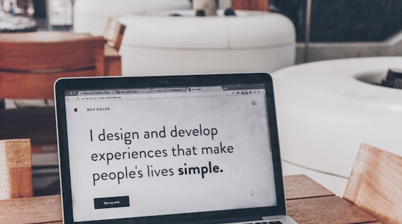 Creative portfolio displayed on laptop and tablet